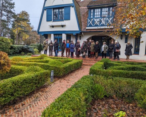 Members of EBTS gather at a villa designed by Louis Quetelart (1888-1950) with topiary garden cleverly filling the narrow pointed triangle of the plot in front